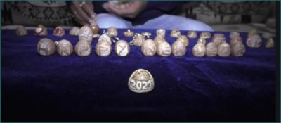 Miniature artist creates beautiful artworks on betel nuts