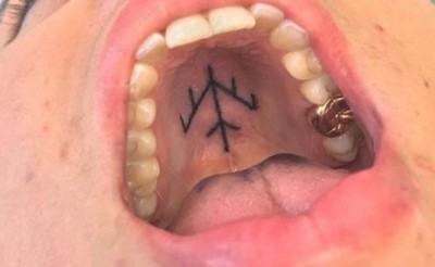 People following bizarre trend of getting tattoed inside the mouth