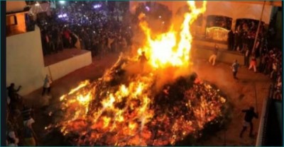 Here is ancient tradition of priests passing through burning Holika